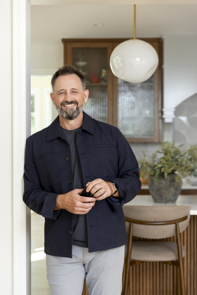 Matt Schmidt, owner plus sales and design for Vujovich Design Build. In a home setting.