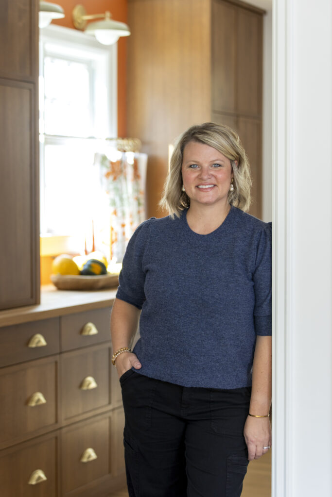 Christina Rymer, lead design director, for Vujovich Design Build. In a kitchen setting.