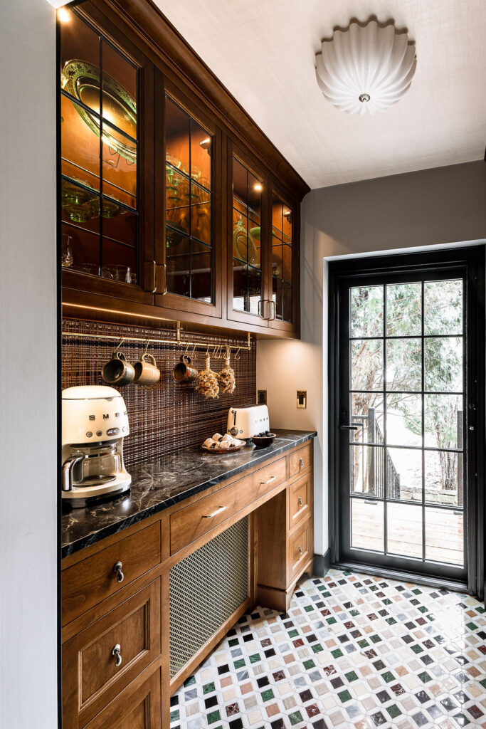 Wood cabinets with glass for beverage bar, terrazo flooring, copper backsplash, Minneapolis butler's pantry